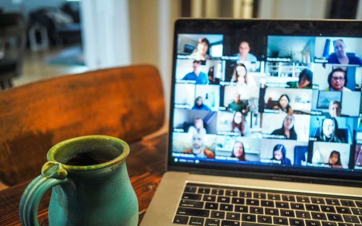 A laptop showing a group video call